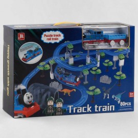 Железная дорога 599-28 A (18) на батарейках, 80 деталей, локомотив, вагон, 2 фигурки, 3 динозавра, декорации, аксессуары, звук, в коробке